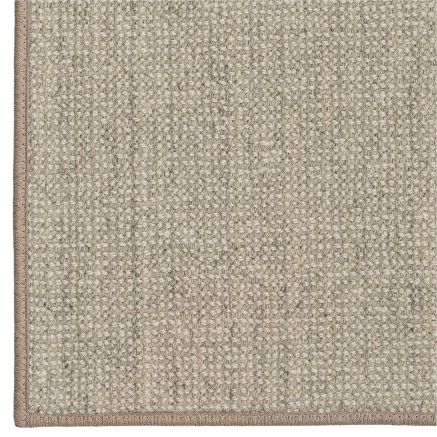 Close-up of a textured beige carpet