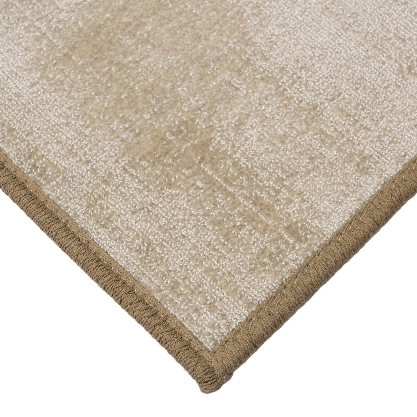 Tyson hand-loomed performance carpet, subtle texture bedroom rug, living room rug, or office rug. Contemporary tan nylon rug corner