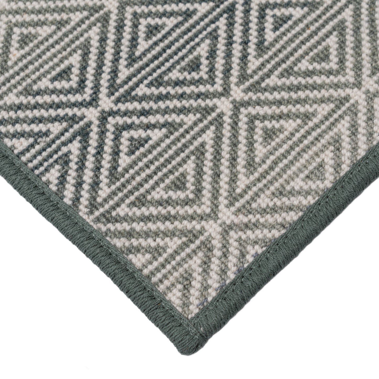 Korey Adriatic Geometric wilton rug. A colorful wool-blend wilton carpet whose intricate geometric pattern works beautifully as a living room rug, bedroom rug, or office rug