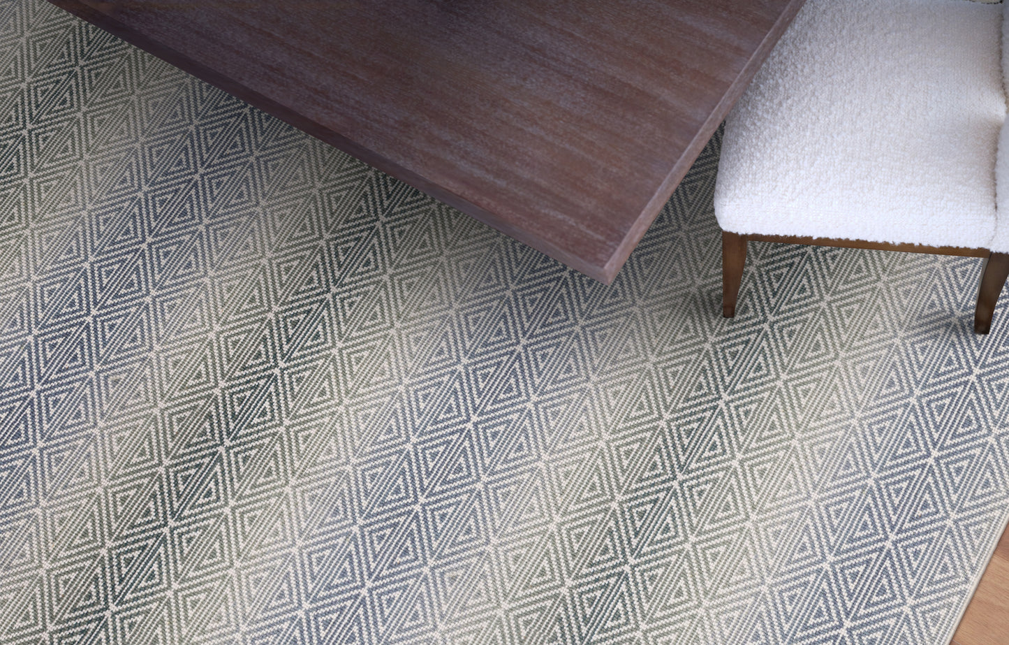 A colorful wool-blend wilton carpet with intricate geometric pattern