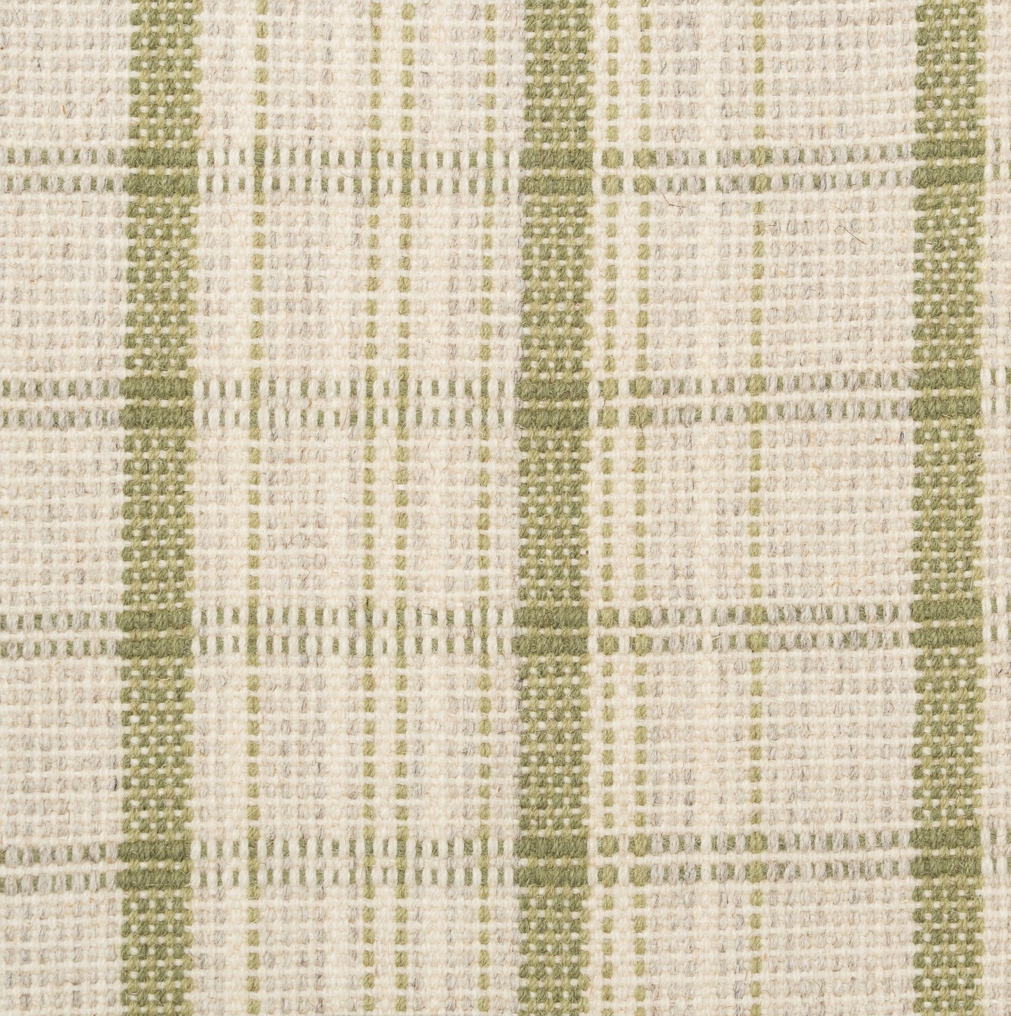 Breckenridge aloe green plaid wool rug. A hand-loomed wool carpet with a charming plaid pattern in earthy tones perfect for a living room rug, bedroom rug, office rug, a stair runner, or a hallway runner