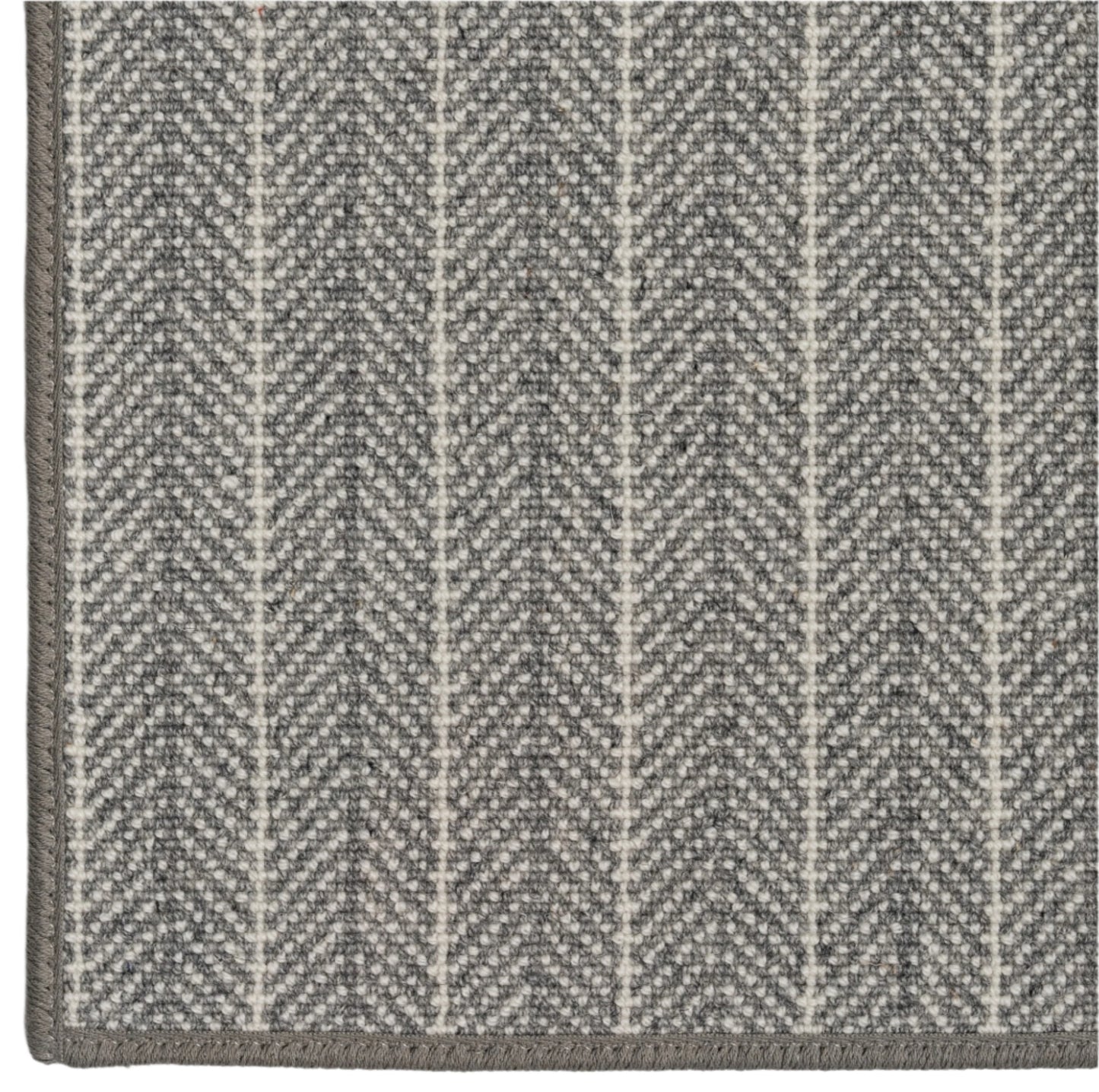 Close-up of a gray and white patterned rug