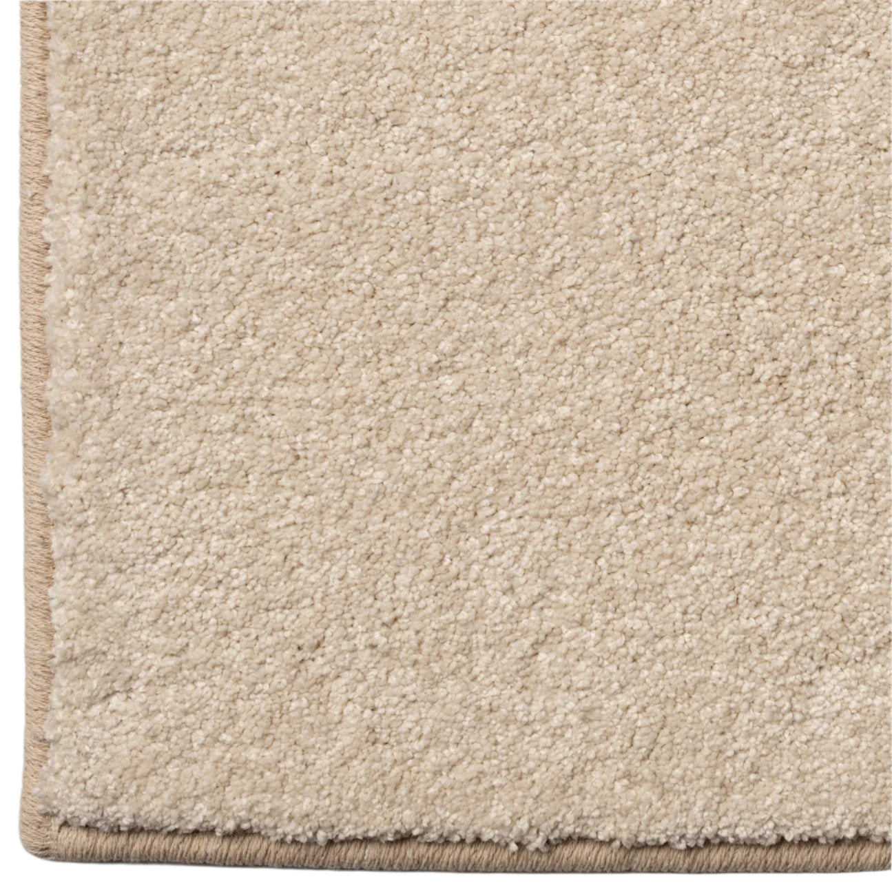 Close-up of a beige carpet with a soft texture