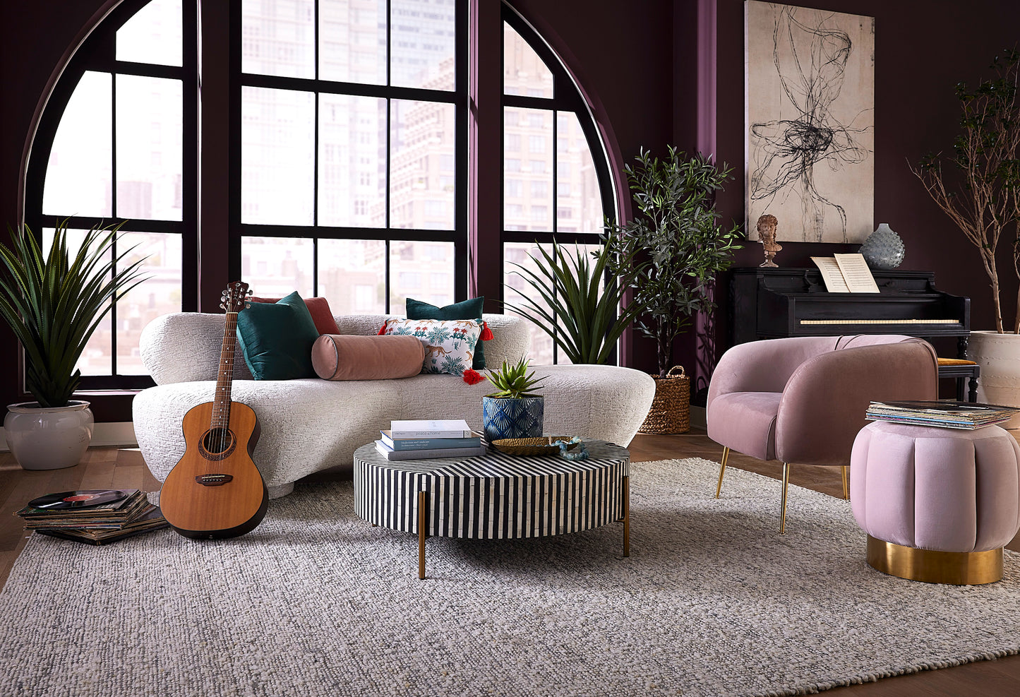 Contemporary room in violet tones with a luxury, wool blend rug from Home Carpet One.