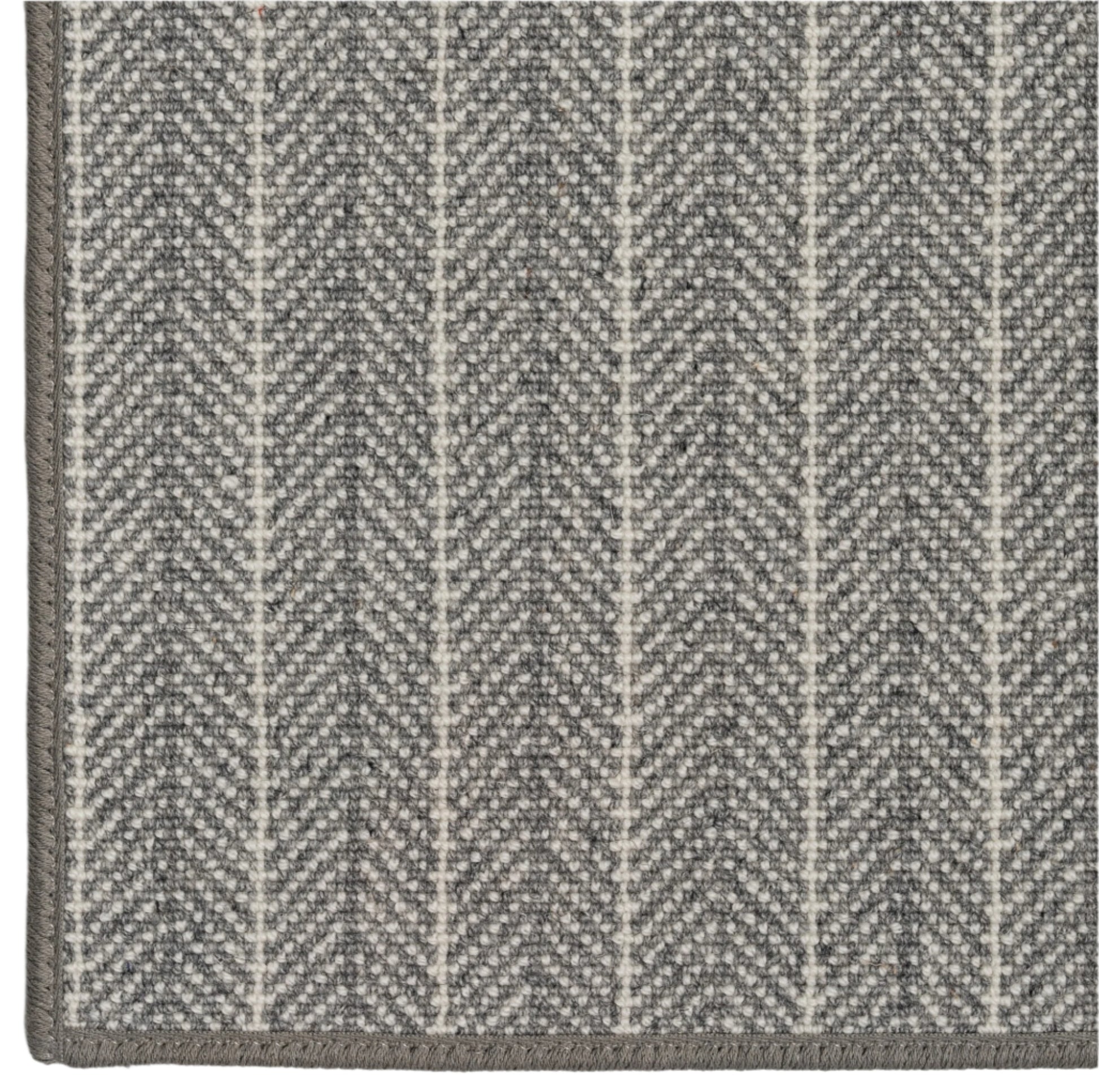 Close-up of a gray and white patterned rug