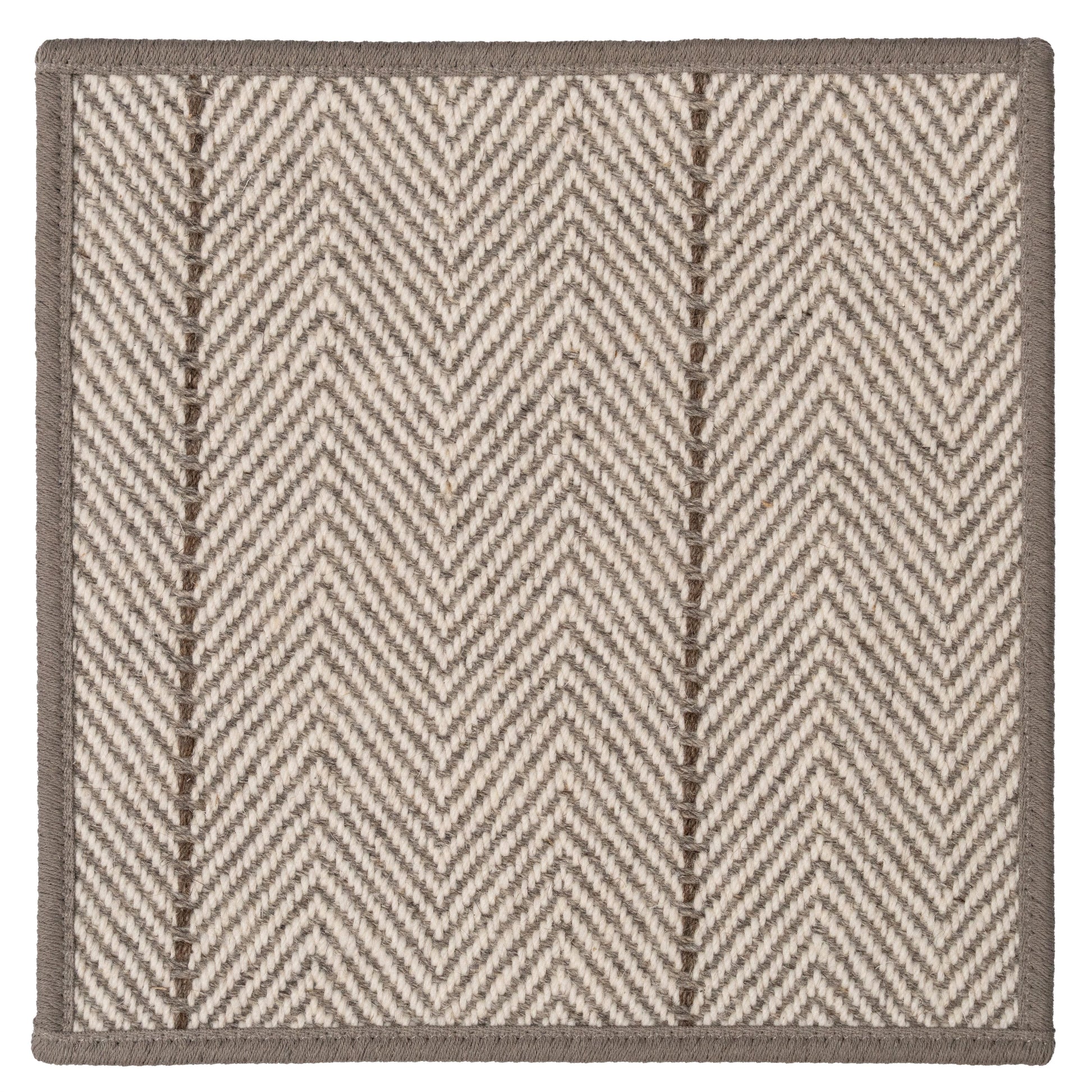 Rug with a chevron pattern on a white background