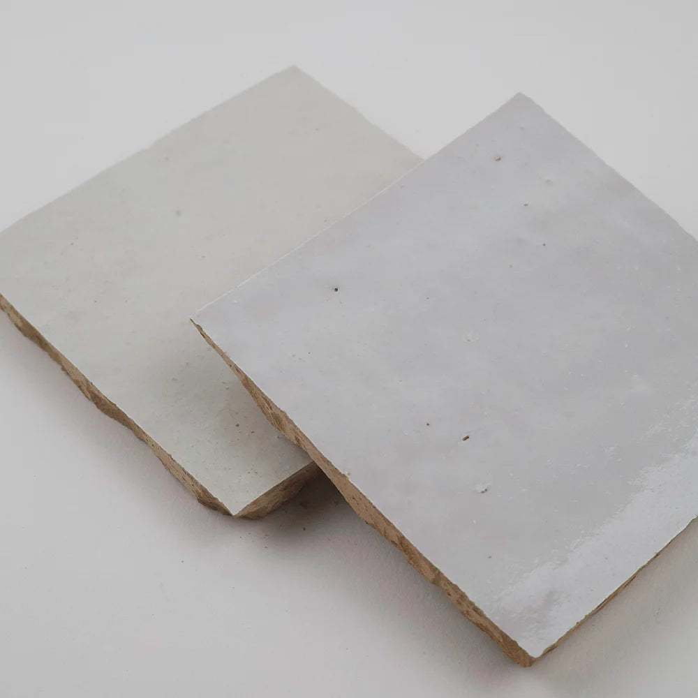 Stacked white square zellige tiles